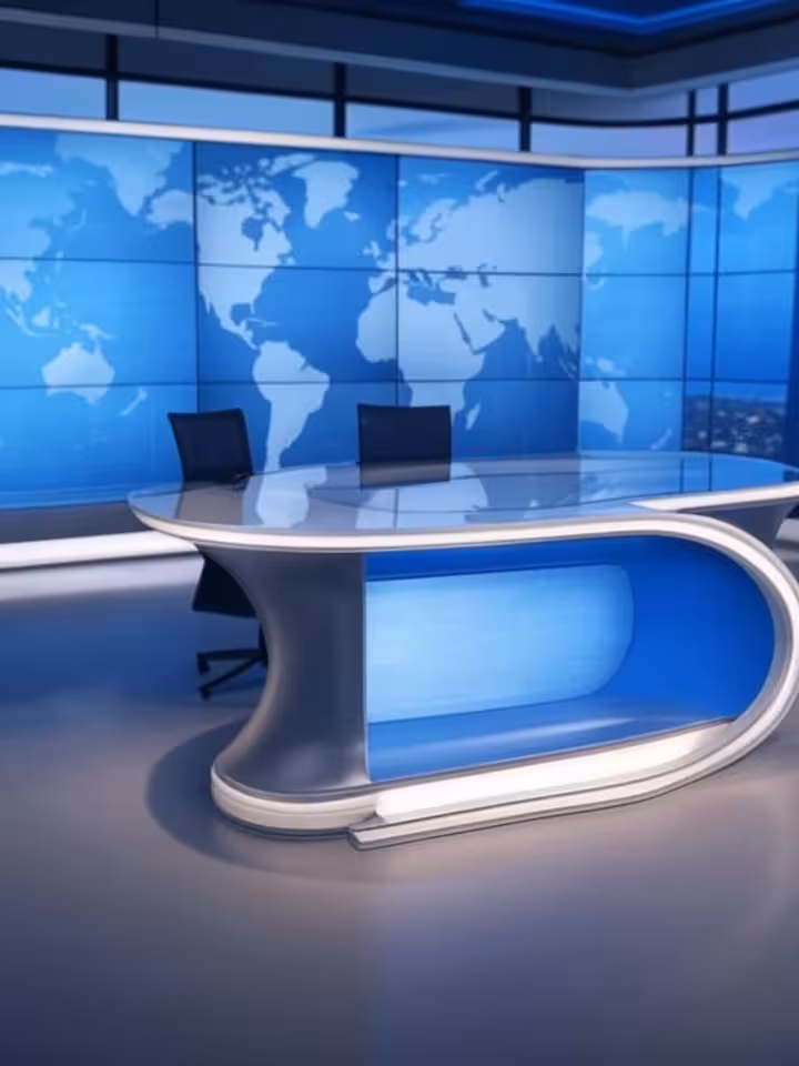 Modern television studio setup with world map screens and news desk, broadcast journalism environmen