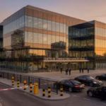 Albert Bourla at Bilderberg 2024: Evidence-Based Analysis of Pfizer CEO's Alleged Attendance in Madrid Modern glass conference center building in Madrid Spain with security barriers and unmarked black ca